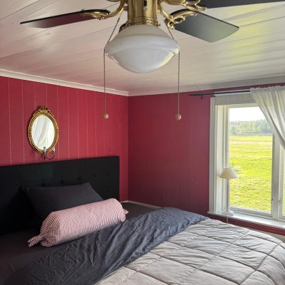 master bedroom fireplace and nature view